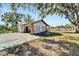 Single story house with carport and fenced yard at 11109 Sumner Rd, Wimauma, FL 33598