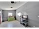 Entryway with gray walls, tiled floor, and decor at 11109 Sumner Rd, Wimauma, FL 33598