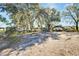 Long driveway leading to property at 11109 Sumner Rd, Wimauma, FL 33598