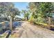 Gravel driveway leading to property at 11109 Sumner Rd, Wimauma, FL 33598