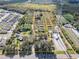 Aerial view showcasing a large lot with surrounding residential areas and agricultural land at 11109 Sumner Rd, Wimauma, FL 33598