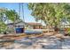 Single story house with carport and gated entrance at 11109 Sumner Rd, Wimauma, FL 33598