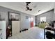 Bright entryway with red door and gray walls at 11109 Sumner Rd, Wimauma, FL 33598