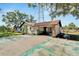 Single story house with carport and fenced yard at 11109 Sumner Rd, Wimauma, FL 33598