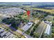 Aerial view of property showing location near a cell tower and neighboring properties at 11109 Sumner Rd, Wimauma, FL 33598