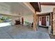Covered carport with access to the front door and a view of the pool at 11109 Sumner Rd, Wimauma, FL 33598