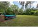 Large backyard with above ground pool at 12805 Flint Creek Rd, Thonotosassa, FL 33592