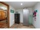 Basement features a safe, refrigerator and extra storage at 12805 Flint Creek Rd, Thonotosassa, FL 33592
