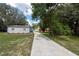 Long driveway to house and garages at 12805 Flint Creek Rd, Thonotosassa, FL 33592