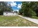 Concrete driveway leading to house at 12805 Flint Creek Rd, Thonotosassa, FL 33592