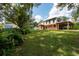 Two-story home with detached garage and covered patio at 12805 Flint Creek Rd, Thonotosassa, FL 33592