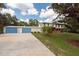 Two-story home with detached garage and covered patio at 12805 Flint Creek Rd, Thonotosassa, FL 33592