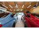 Well-lit garage with space for two cars and workshop area at 12805 Flint Creek Rd, Thonotosassa, FL 33592