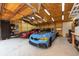 Garage with additional storage and two cars at 12805 Flint Creek Rd, Thonotosassa, FL 33592