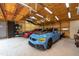 Well-lit garage with space for two cars and workshop area at 12805 Flint Creek Rd, Thonotosassa, FL 33592