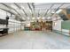 Spacious garage with ample storage and room for multiple vehicles at 12805 Flint Creek Rd, Thonotosassa, FL 33592