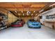 Well-lit garage with space for two cars and workshop area at 12805 Flint Creek Rd, Thonotosassa, FL 33592