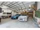 Large garage, easily fits multiple cars, has overhead storage at 12805 Flint Creek Rd, Thonotosassa, FL 33592