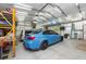 Garage with storage shelving and space for multiple vehicles at 12805 Flint Creek Rd, Thonotosassa, FL 33592