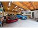 Well-lit garage with space for two cars and workshop area at 12805 Flint Creek Rd, Thonotosassa, FL 33592