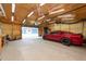 Insulated garage with overhead door and space for car at 12805 Flint Creek Rd, Thonotosassa, FL 33592
