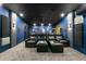 Home theater with comfortable seating and large screen at 12805 Flint Creek Rd, Thonotosassa, FL 33592