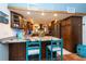 Kitchen boasts granite counters, stainless steel appliances, and custom cabinetry at 12805 Flint Creek Rd, Thonotosassa, FL 33592