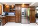 Well-equipped kitchen with stainless steel appliances and ample storage at 12805 Flint Creek Rd, Thonotosassa, FL 33592