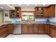 Large kitchen with granite countertops, stainless steel appliances, and ample cabinetry at 12805 Flint Creek Rd, Thonotosassa, FL 33592