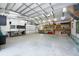 Spacious workshop with ample storage and workbench at 12805 Flint Creek Rd, Thonotosassa, FL 33592
