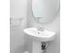 Bathroom featuring pedestal sink and decorative framed mirror at 12820 Belvedere Song Way, Riverview, FL 33578