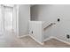 Hallway area featuring carpet and stairway access at 12820 Belvedere Song Way, Riverview, FL 33578