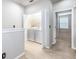Convenient upstairs laundry room featuring a modern washer and dryer at 12820 Belvedere Song Way, Riverview, FL 33578