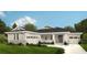 Charming single Gathering home boasts a two-car garage, landscaped lawn, and stylish architectural design at 4729 Majestic Hills Loop, Brooksville, FL 34601