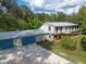 Two-story home with attached garage and large yard at 12805 Flint Creek Rd, Thonotosassa, FL 33592