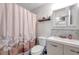 Updated bathroom with a new vanity and shower at 1308 13Th Se Cir, Largo, FL 33771