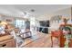 Spacious living room with hardwood floors and comfy furniture at 1308 13Th Se Cir, Largo, FL 33771