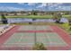 Two tennis courts with surrounding fencing at 1308 13Th Se Cir, Largo, FL 33771