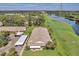 Aerial view of condo building with carport and surrounding landscape at 1308 13Th Se Cir, Largo, FL 33771
