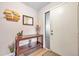 Inviting entryway with console table and decor at 1308 13Th Se Cir, Largo, FL 33771