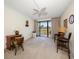 Bright bedroom with balcony access and golf course view at 50 Coe Rd # 322, Belleair, FL 33756