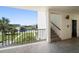Hallway with stairs, elevator, and outdoor view at 50 Coe Rd # 322, Belleair, FL 33756