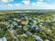 Wide aerial view of neighborhood, showing homes and landscape at 4104 W El Prado Blvd, Tampa, FL 33629