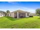 House with large backyard and screened patio at 4911 Rock Island Ct, Wimauma, FL 33598