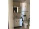 Clean bathroom with vanity, toilet and medicine cabinet at 255 Dolphin Pt # 909, Clearwater, FL 33767