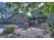 House exterior with three-car garage and walkway at 5333 Cobblestone Ct, Wesley Chapel, FL 33543