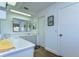 Bright bathroom with double vanity and tiled countertops at 5333 Cobblestone Ct, Wesley Chapel, FL 33543