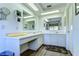 Double vanity bathroom with a large mirror and tile flooring at 5333 Cobblestone Ct, Wesley Chapel, FL 33543