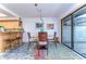 Cozy dining area with a round table and access to a patio at 5333 Cobblestone Ct, Wesley Chapel, FL 33543