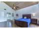 Spacious bedroom with dark wood floors and high ceilings at 5333 Cobblestone Ct, Wesley Chapel, FL 33543